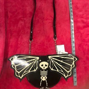 Glow in the dark skeleton bat purse